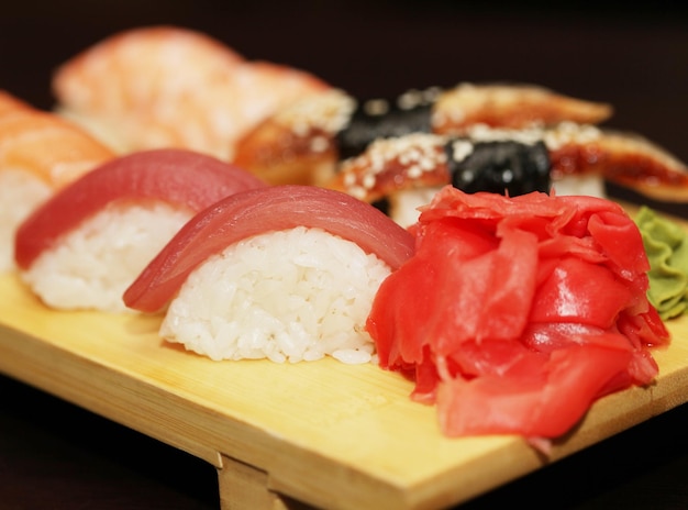 Sushi served on wooden board