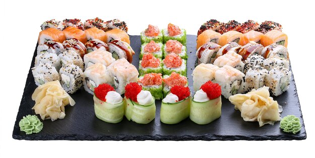 Sushi set on ceramic boards On white background