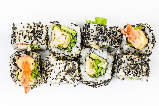 Sushi set with leawes salad and tiger shrimps