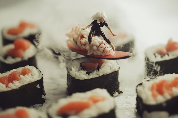 a sushi with a figurine on it