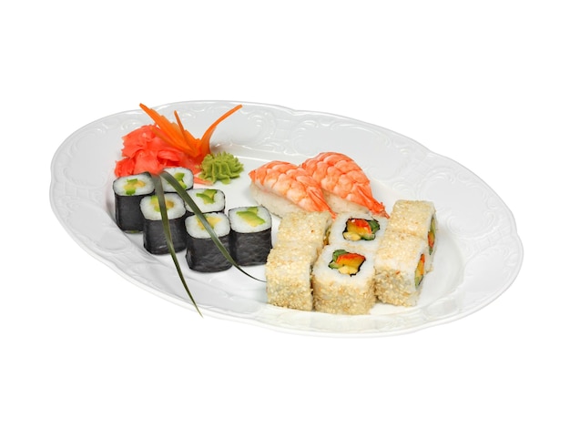 Sushi with shrimps and rolls with cucumber avocado paprika and nori