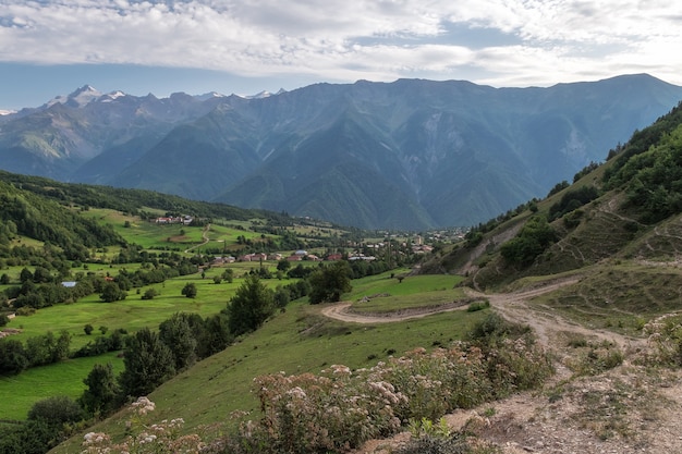 Svaneti village under huge mountais