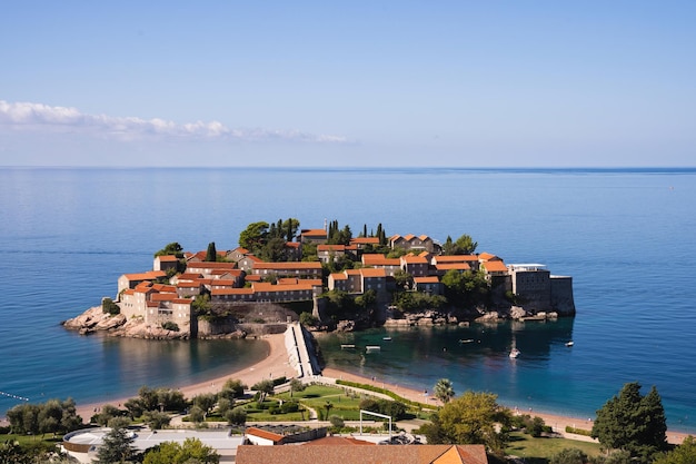 Sveti stefan village built in the middle of a piece of land that juts out into the sea Montenegro