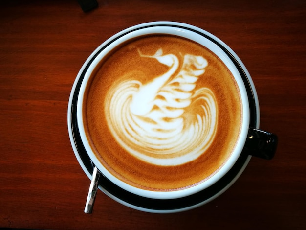 Photo swan on my coffee