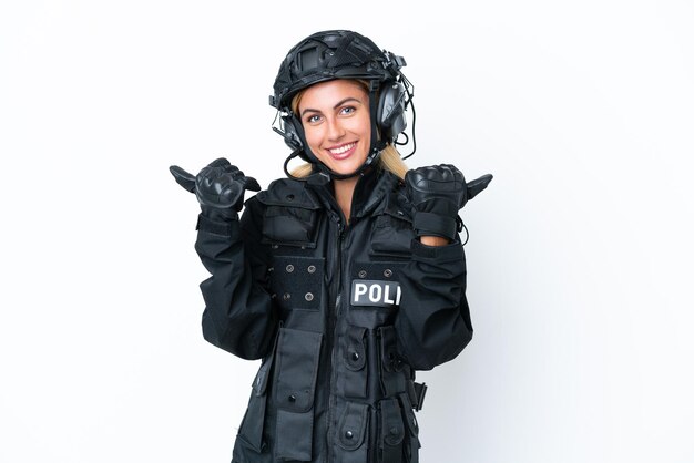 SWAT caucasian woman isolated on white background with thumbs up gesture and smiling