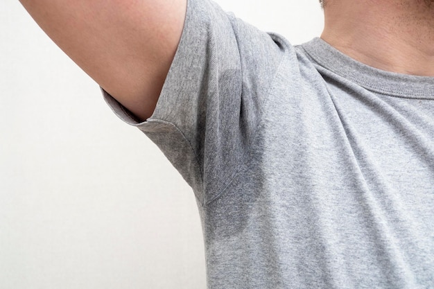 Sweaty armpit wet underarm wet stain on grey tshirtx9xA