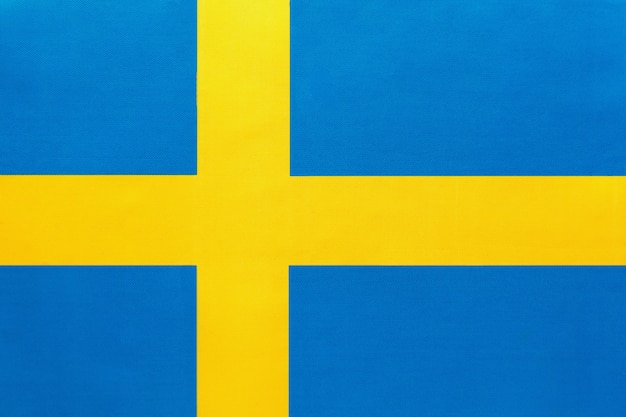 Sweden national fabric flag with emblem, textile background, Symbol of international world european country,