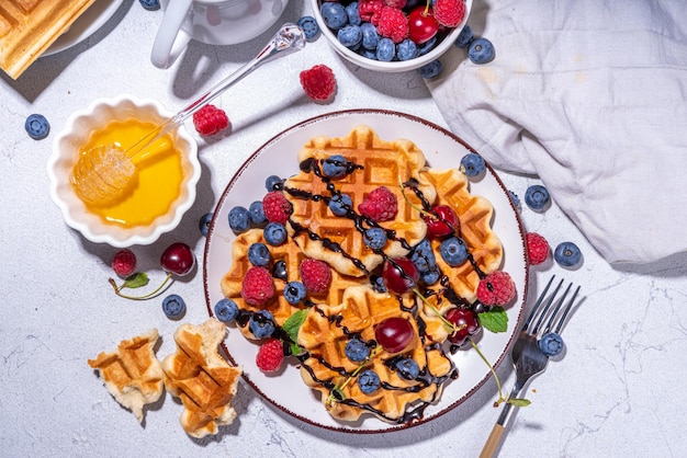 Sweet belgian waffles with berry