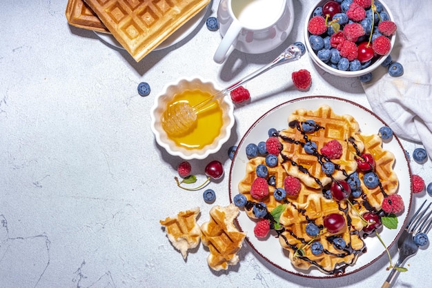 Sweet belgian waffles with berry