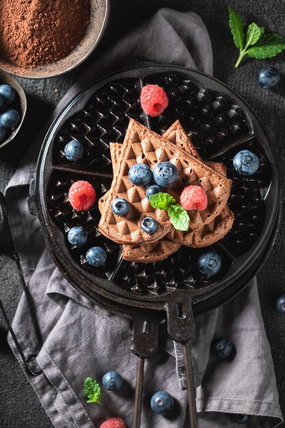 Sweet and brown dark waffles made of old style