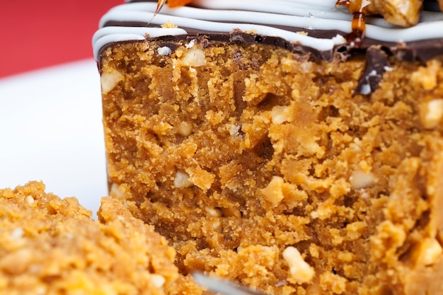 Sweet cake made of peanuts, sugar and dairy products, made in the shape of a cylinder