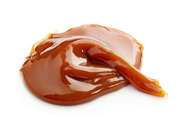 Sweet caramel sauce on white background top view