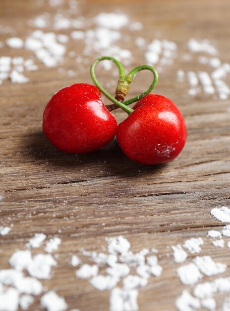 Sweet cherries on wooden table