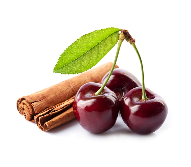 Sweet cherry with cinnamon steak on white backgrounds. Healthy food ingredient.