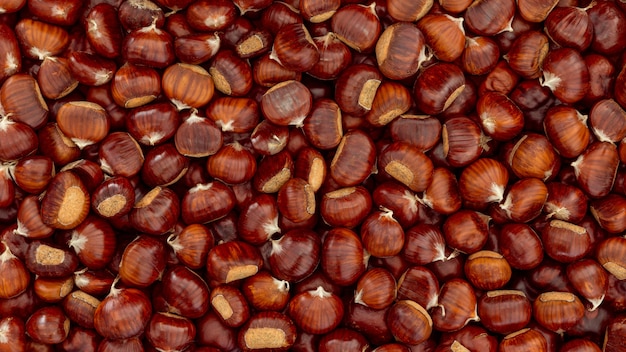 Sweet Chestnuts background for the backdrop. Flat lay of chestnut.