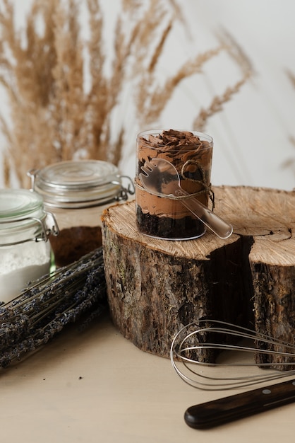 Sweet chocolate pudding and wood cut on table kitchen decor