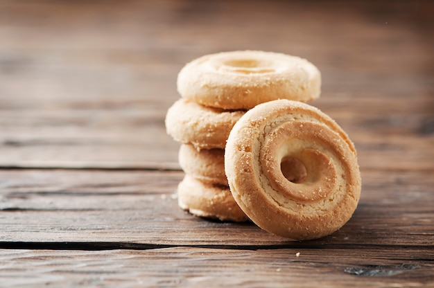 Sweet cookies on wooden table