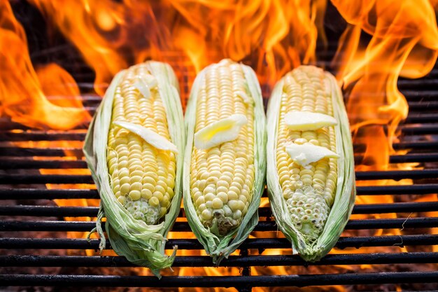 Sweet corn on grill with butter and salt