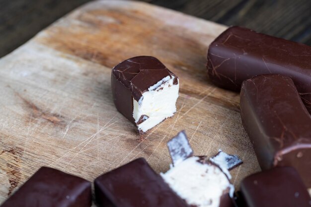 Sweet cottage cheese in chocolate glaze cake made of dairy product and chocolate with cocoa