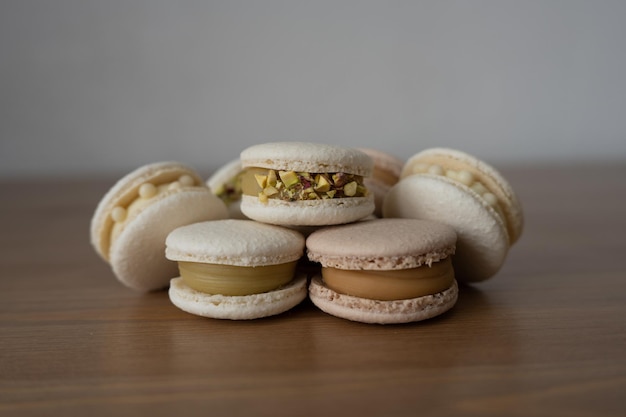 Sweet dessert macaroons on a wooden table