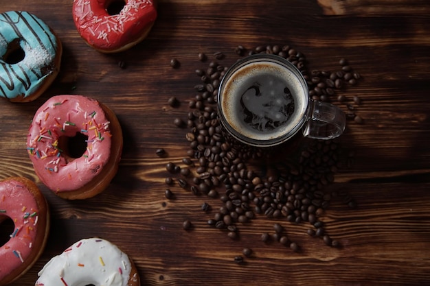 Sweet donuts on a dessert on a wooden background