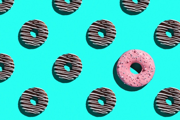 Sweet donuts pattern on a blue background.