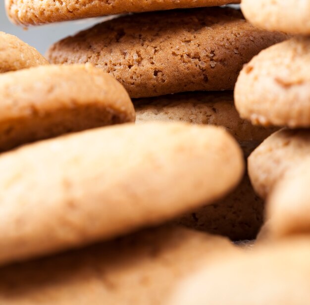 Photo not sweet dry and crunchy cookies, the porous structure of real round cookies, round cookies made from wheat and oat flour