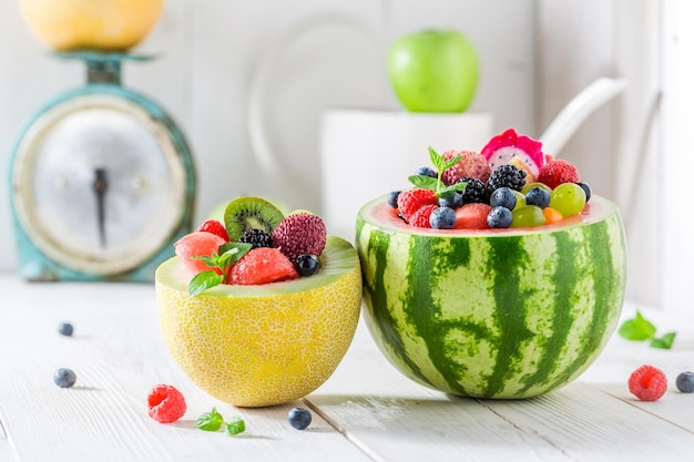 Sweet fruits salad in watermelon and melon in summer day