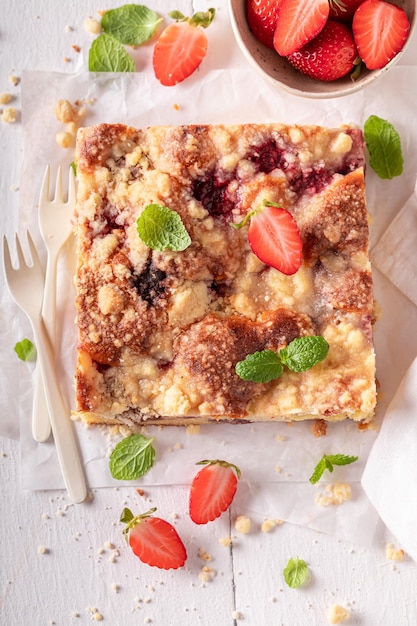 Sweet and homemade strawberry cake as dessert in summer