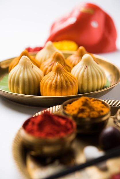 Sweet Modak food offered while Ganapati pooja or Ganesh puja