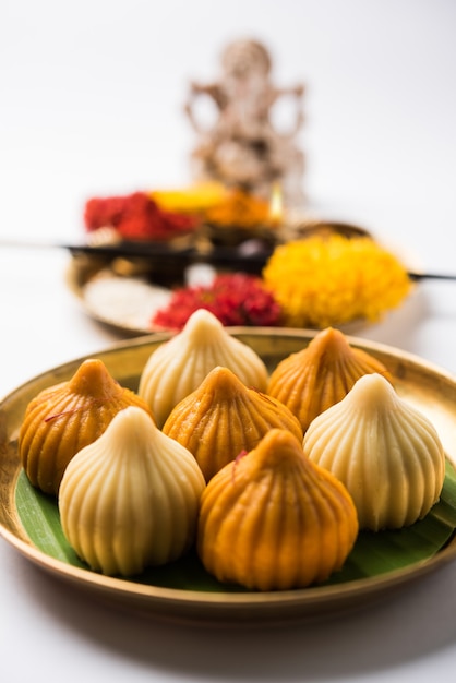 Sweet Modak food offered while Ganapati pooja or Ganesh puja