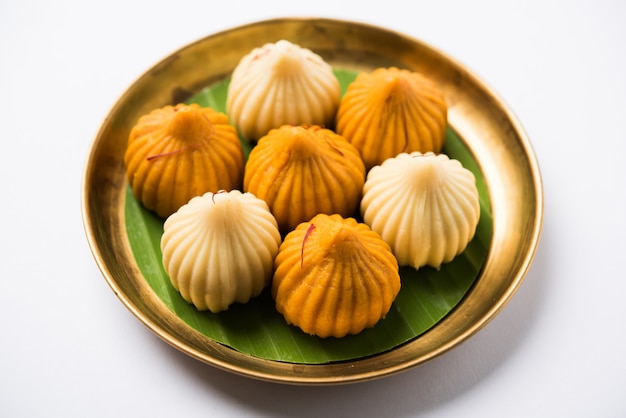 Sweet Modak food offered while Ganapati pooja or Ganesh puja