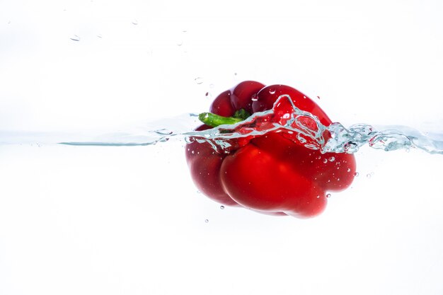 Sweet pepper in the water splashes, the yellow Sweet pepper .