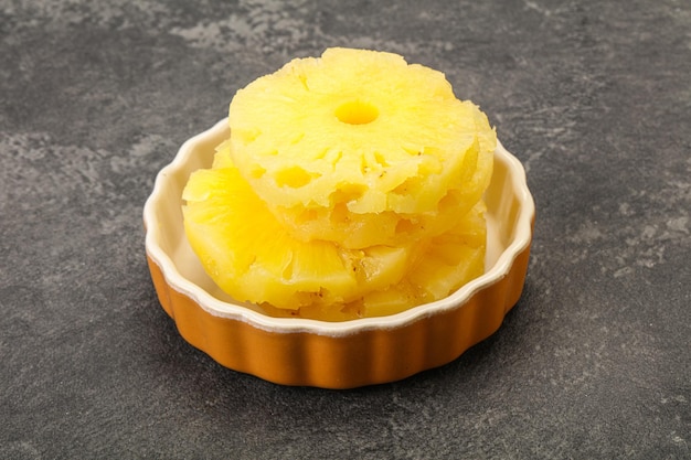 Sweet pineapple rings in the bowl