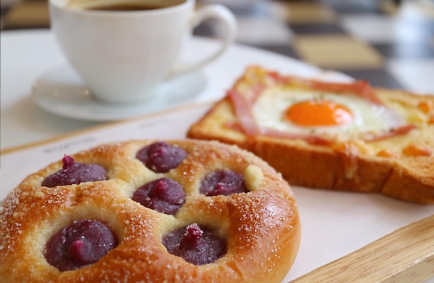 Sweet Potato Puree Bun with Blurry French Toast and Coffee in the Backdrop