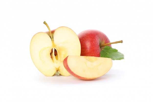 Sweet red apples on white table