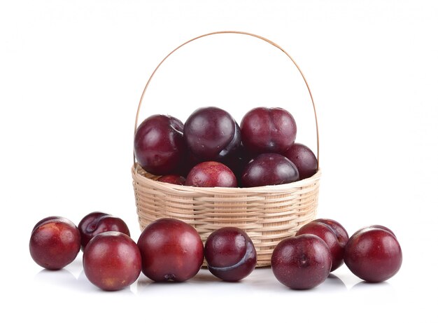 Sweet ripe cherry in the basket isolated