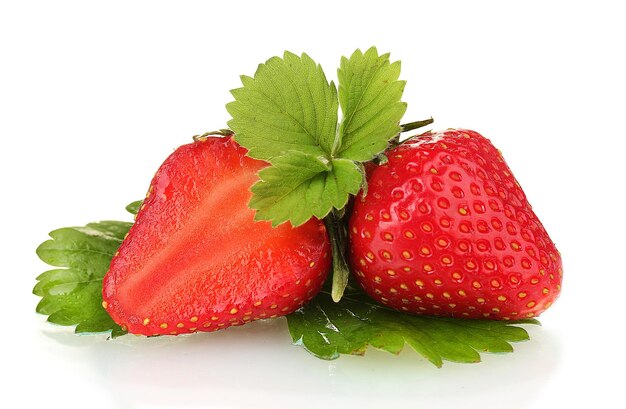 Sweet ripe strawberries with leaves isolated on white