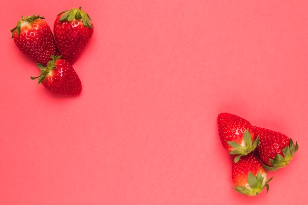 Sweet ripe strawberry on pink back ground