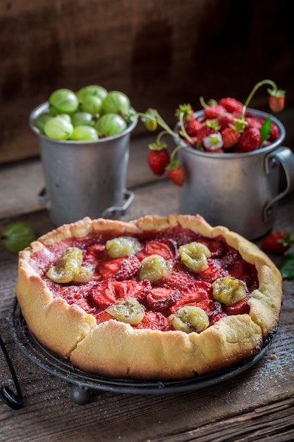 Sweet and sour pie with fresh berry fruits