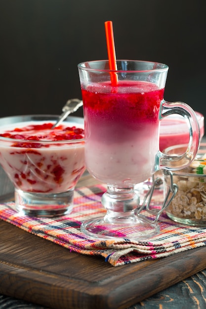 Sweet strawberry and healthy smoothies on the table.