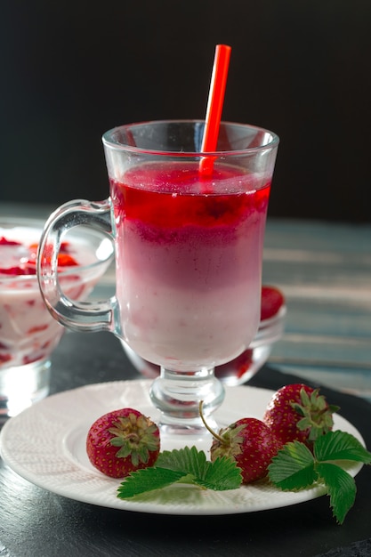 Sweet strawberry and healthy smoothies on the table.