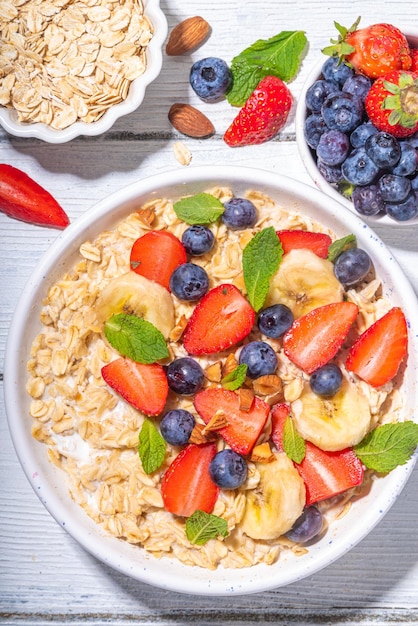 Sweet summer breakfast oatmeal with berry