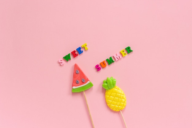 Sweet summer text, Pineapple and watermelon lollipops.