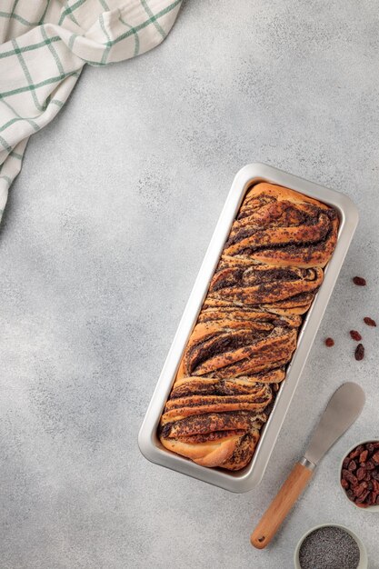 Sweet swirl homemade bread with poppy seeds