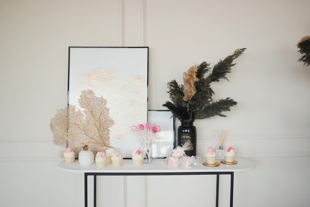 Sweet table decorated with cupcakes and decor