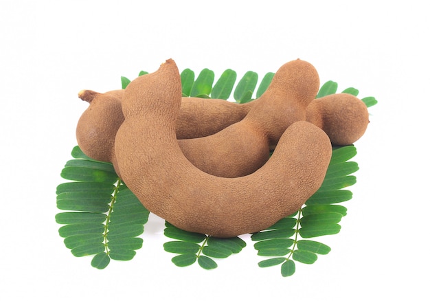 Sweet tamarind and leaf split isolate on white backgrounds