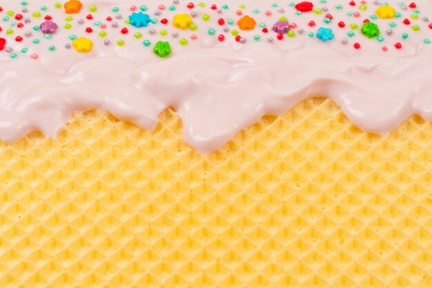 Sweet waffle background with cream