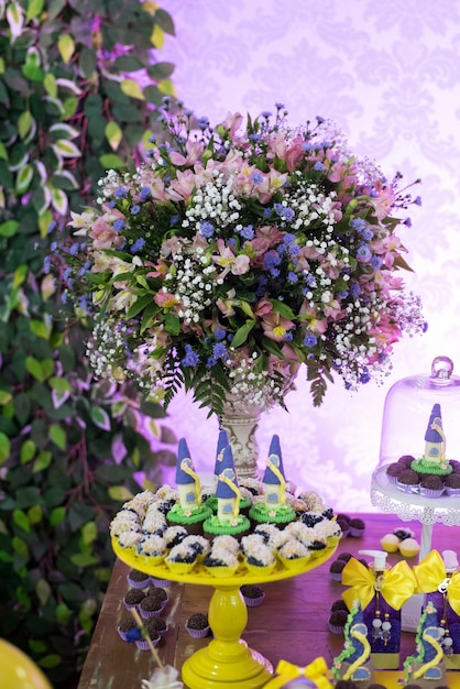 Sweets and decoration on the table - Children's birthday garden theme