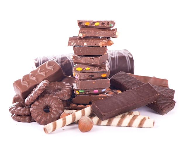 Sweets with nuts and chocolate gingerbread cookies and chocolate isolated on white background